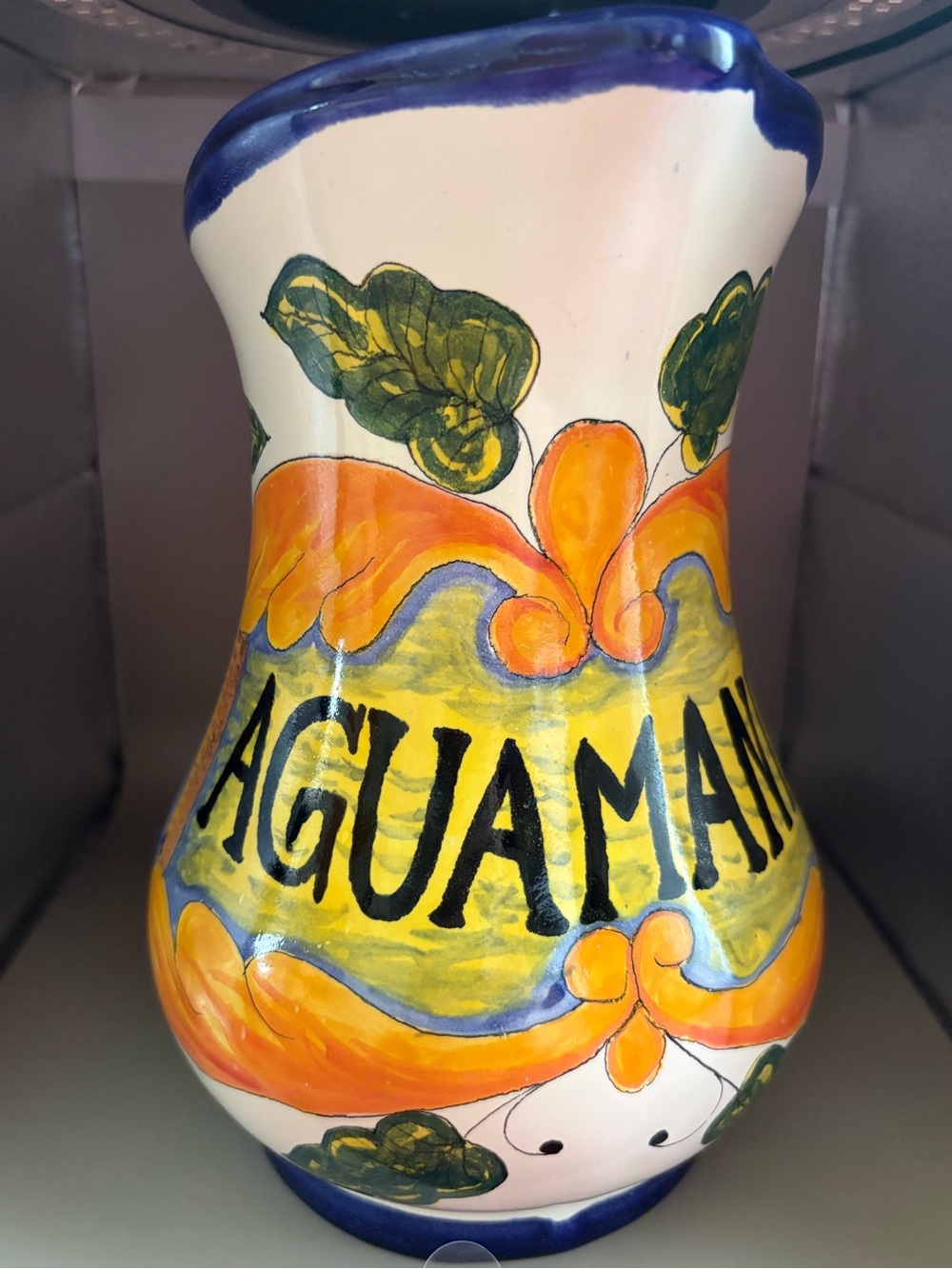 Hand-Painted Ceramic Pitcher in Cream, Blue, Orange, Green, Yellow